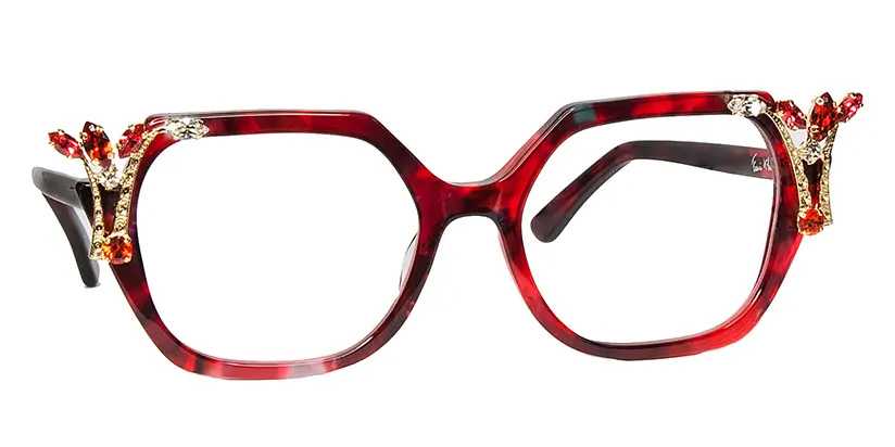 Green, cateye frames with extravagant stones.